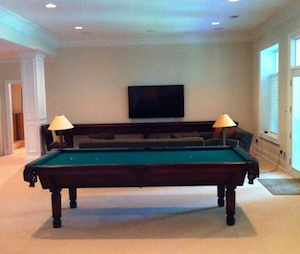 Shuffleboard Table in custom gameroom desgins