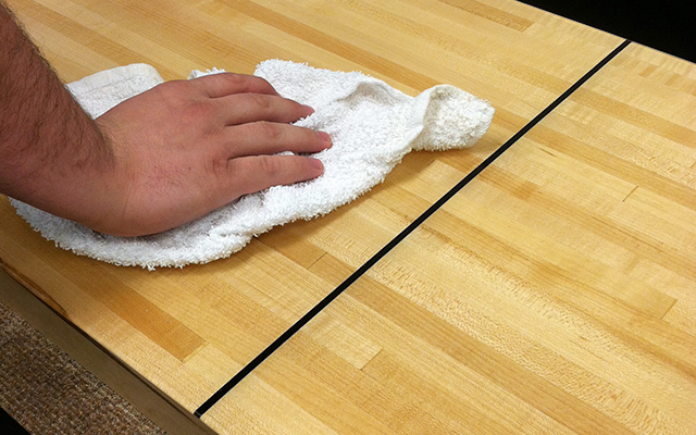 How to use Silicone spray for a Shuffleboard Table to prepare for a game of  Shuffleboard, By McClure Tables