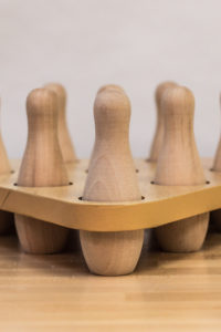 Bring the Bowling Alley to Your Basement Using Your Shuffleboard Table