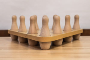 Bring The Bowling Alley To Your Basement Using Your Shuffleboard Table