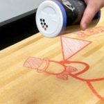 apply shuffleboard table wax